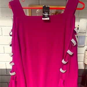 Pink knee length party dress with rinestone trim. New with tags